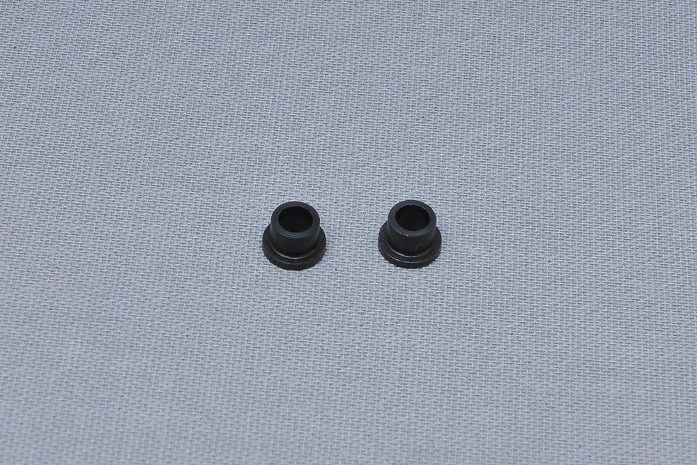 Sprocket play adjustment plate bushing