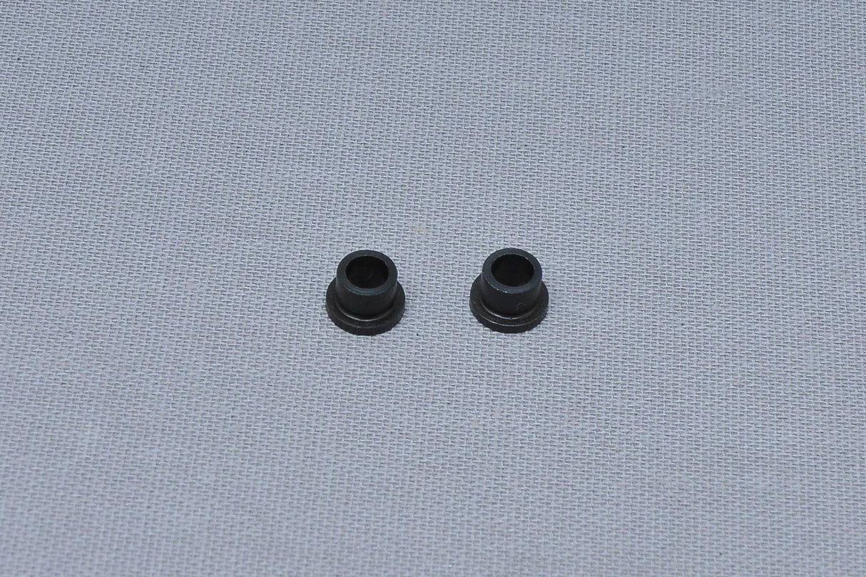 Sprocket play adjustment plate bushing